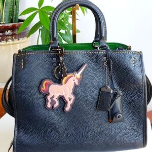 Coach 🦄  Uni   Unicorn retail 1941 bag charm Melon and Oxblood